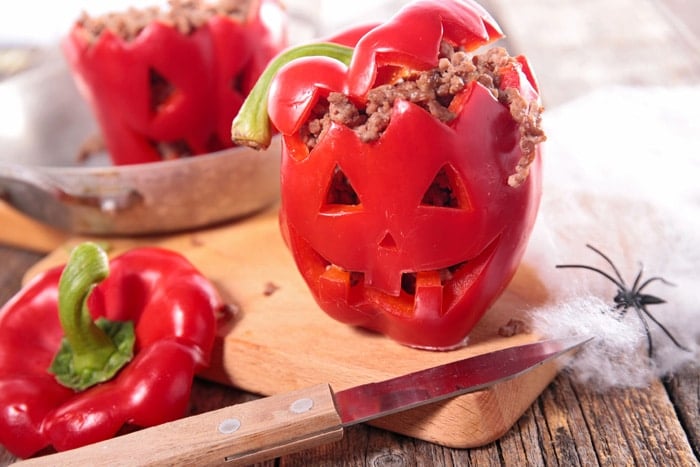 These Spooky Stuffed Peppers are the most fun and filling Halloween dinner. They are fresh bell peppers filled with a simple ground turkey and rice recipe.