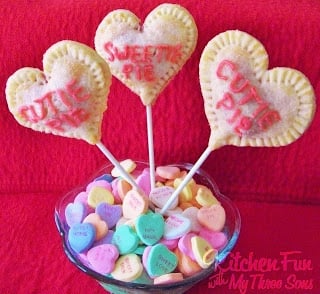 Valentine Conversation Heart Pie Pops with a cherry filling. KitchenFunWithMy3Sons.com