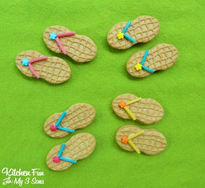 Summer Nutter Butter Flip Flop Cookies for a Beach Party including a Free Printable! So cute & easy from KitchenFunWithMy3Sons.com
