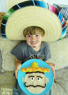 Here is my 6 year old with his fun Cinco de Mayo Mexican Dinner!