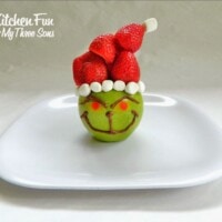 Grinch fruit snack made with apple and strawberries