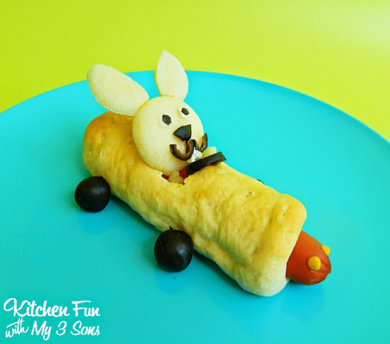 Cheese bunny in a pig in a blanket race car 