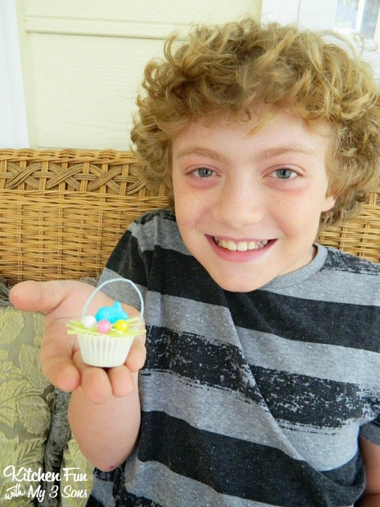 My oldest helper holding this Mini Reese's Cup Easter Basket