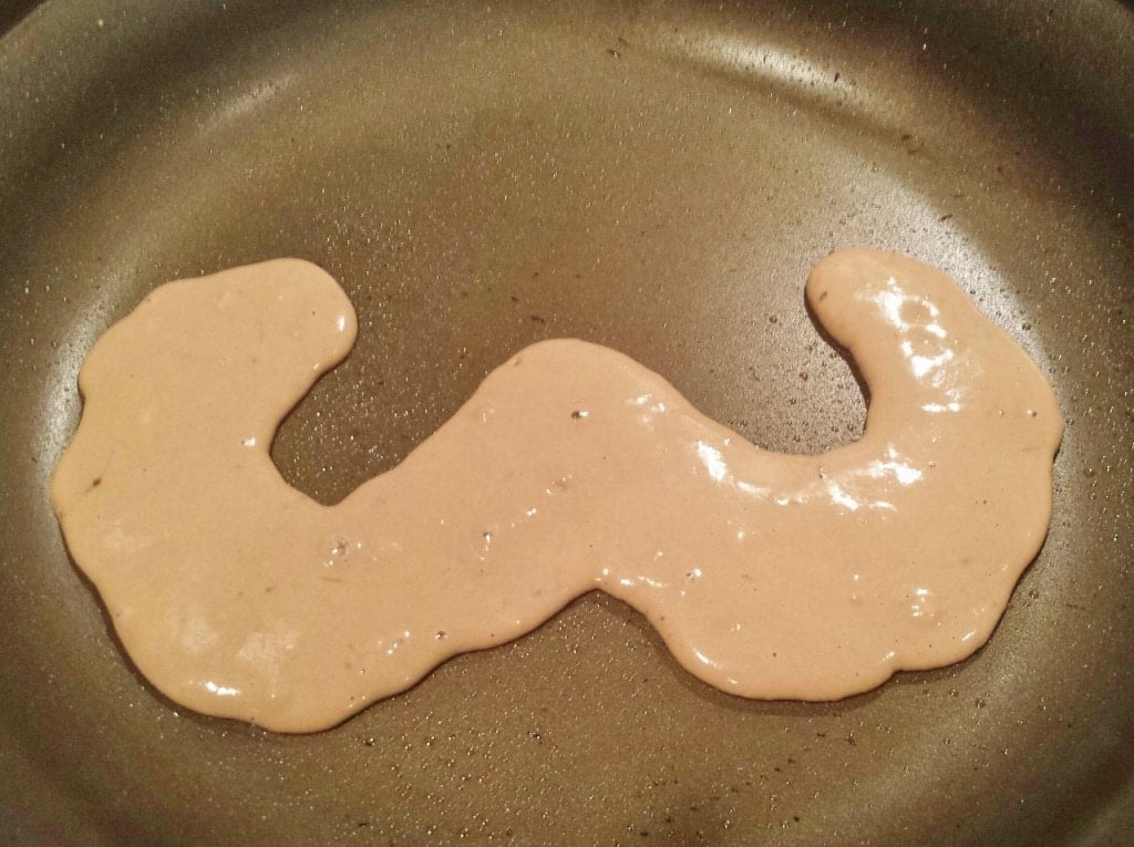 Start out by making your pancake mix & shape a mustache in a pan on low heat like this