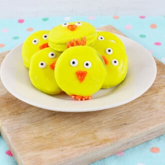 Oreo Easter Chick Cookies on a wooden board.
