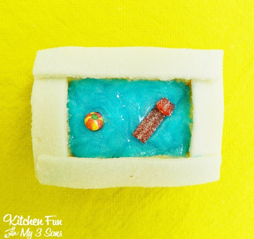 Place the candies on top & now you have a Swimming Pool Rice Krisipes Treat!