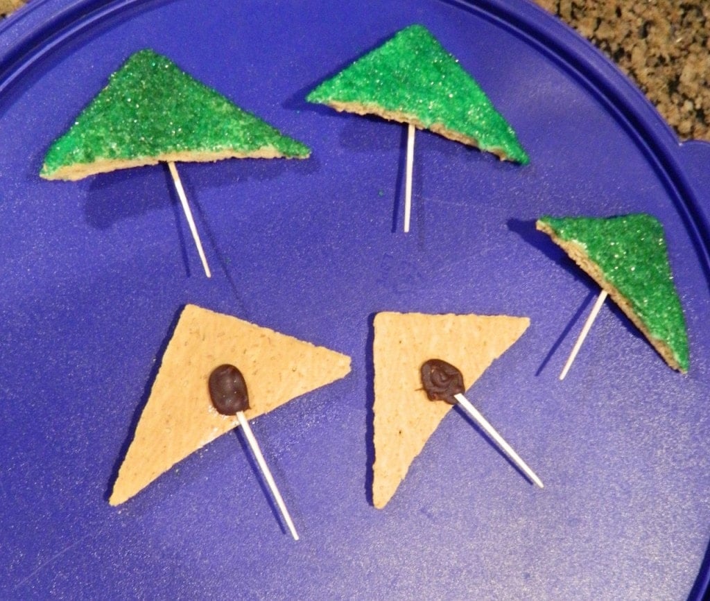 graham cracker horns dipped in green sprinkles