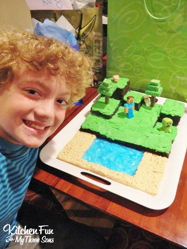 Here is my big birthday boy with his Minecraft Cake!