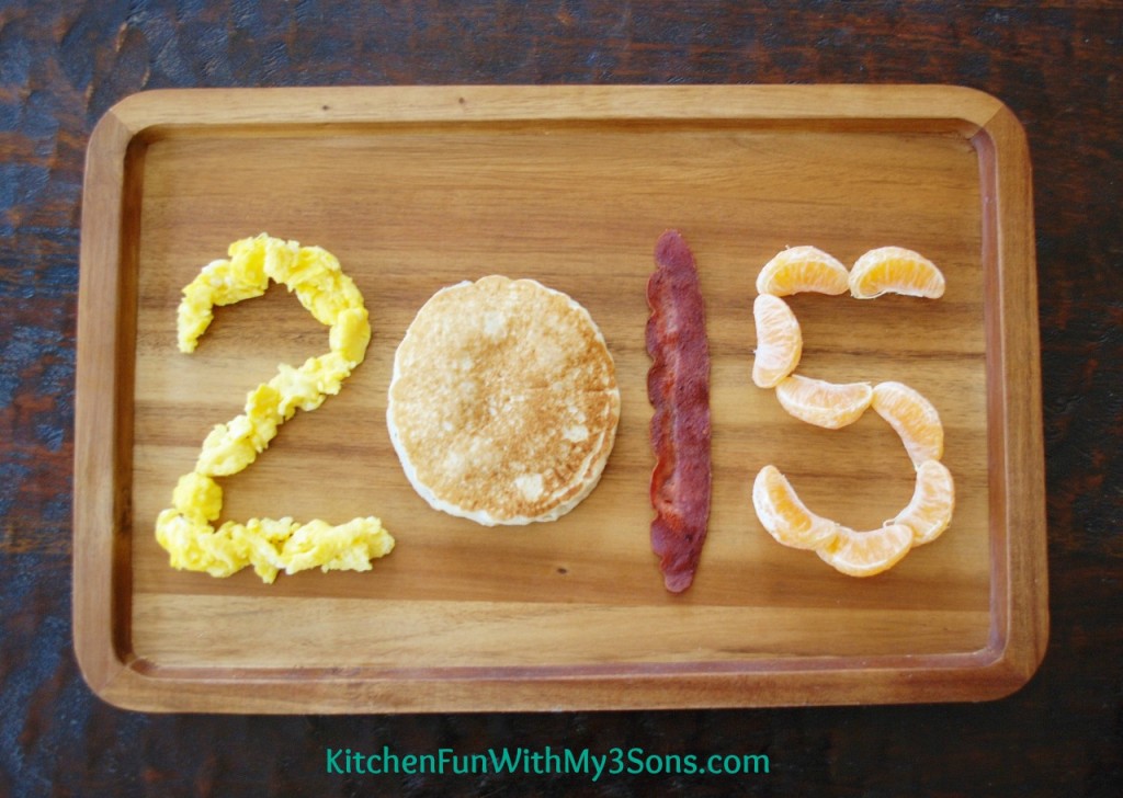 New Year's Breakfast made with pancakes, eggs, and fruit