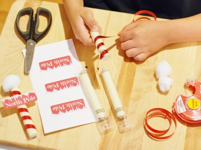 Christmas North Pole Cheese Stick Snacks with a Free Printable! KitchenFunWithMy3Sons.com