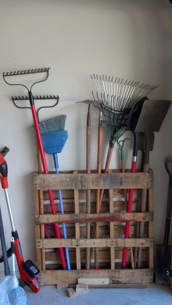 DIY Pallet Garage Storage...these are awesome DIY Pallet & Wood Ideas!