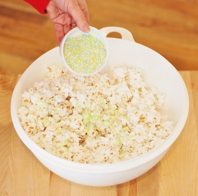 white chocolate popcorn with Easter sprinkles