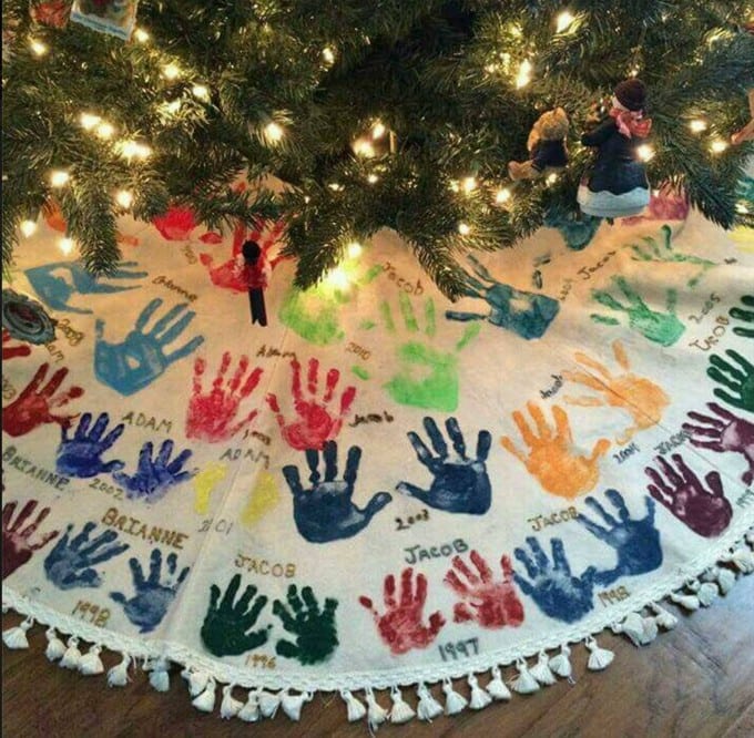 Handprint Christmas Tree Skirt...what a great tradition! These are the BEST Handprint & Footprint Ideas!