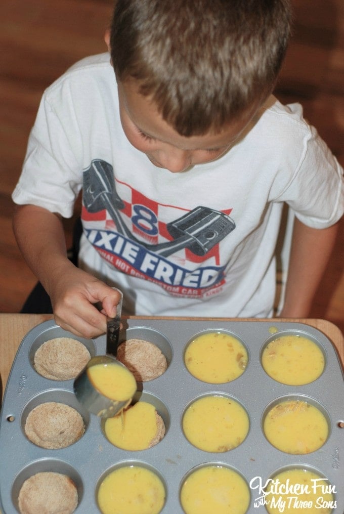 Pouring the egg mixture in the muffin tins