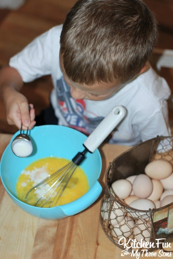 Adding ingredients to the eggs