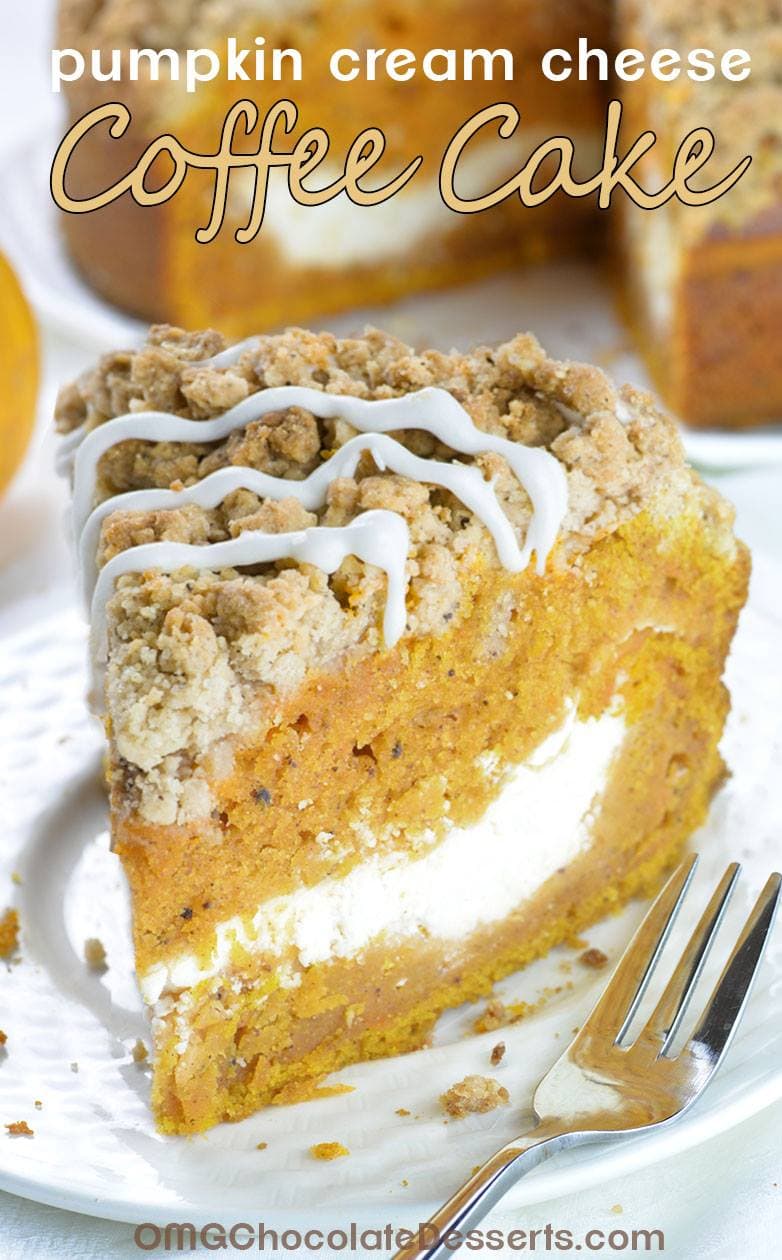 A slice of Pumpkin Cream Cheese Coffee Cake on a white plate with a fork.