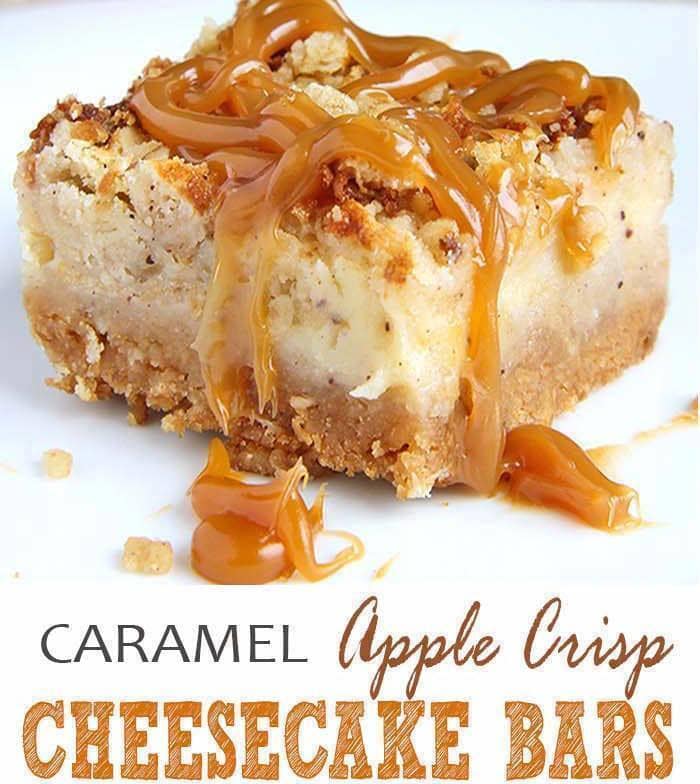 A square of caramel apple crisp cheesecake bar on a white plate, with drips of caramel sauce all over the plate.