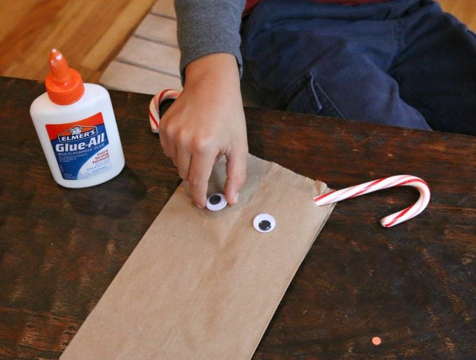 Christmas Rudolph the Red Nose Reindeer Treat Bags...such a fun and easy Holiday craft idea for the Kids!