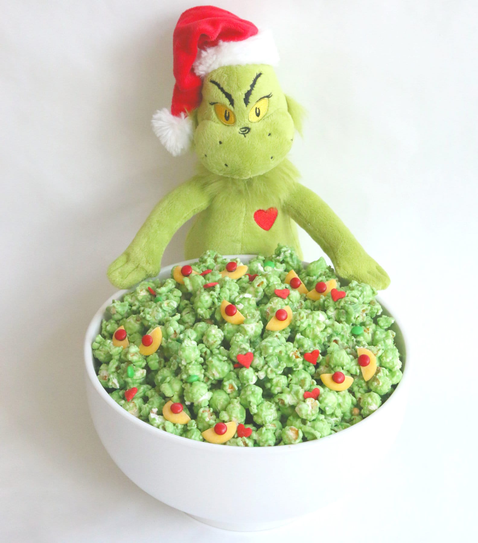 Grinch Popcorn in a white bowl