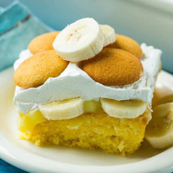 A slice of banana pudding poke cake