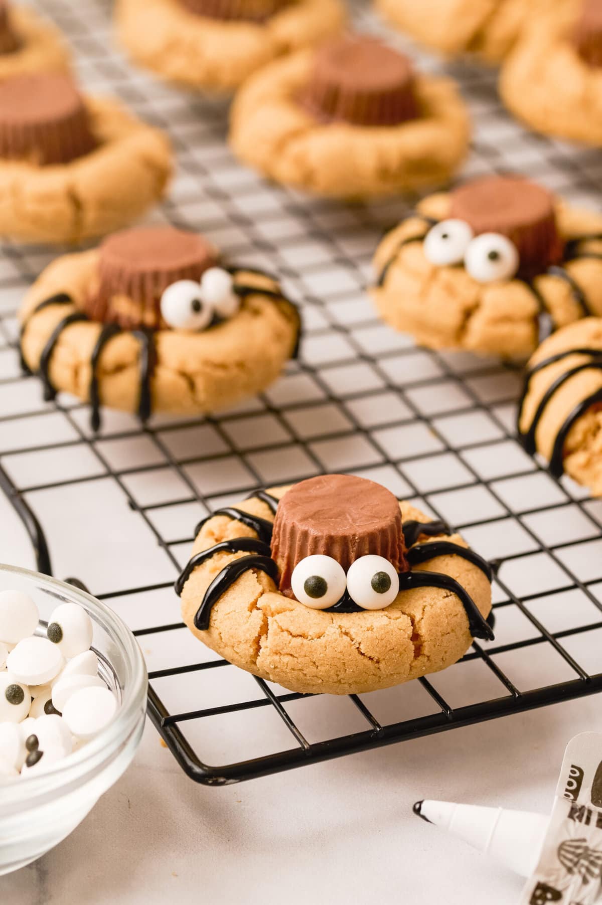 spider cookies on cooling rack