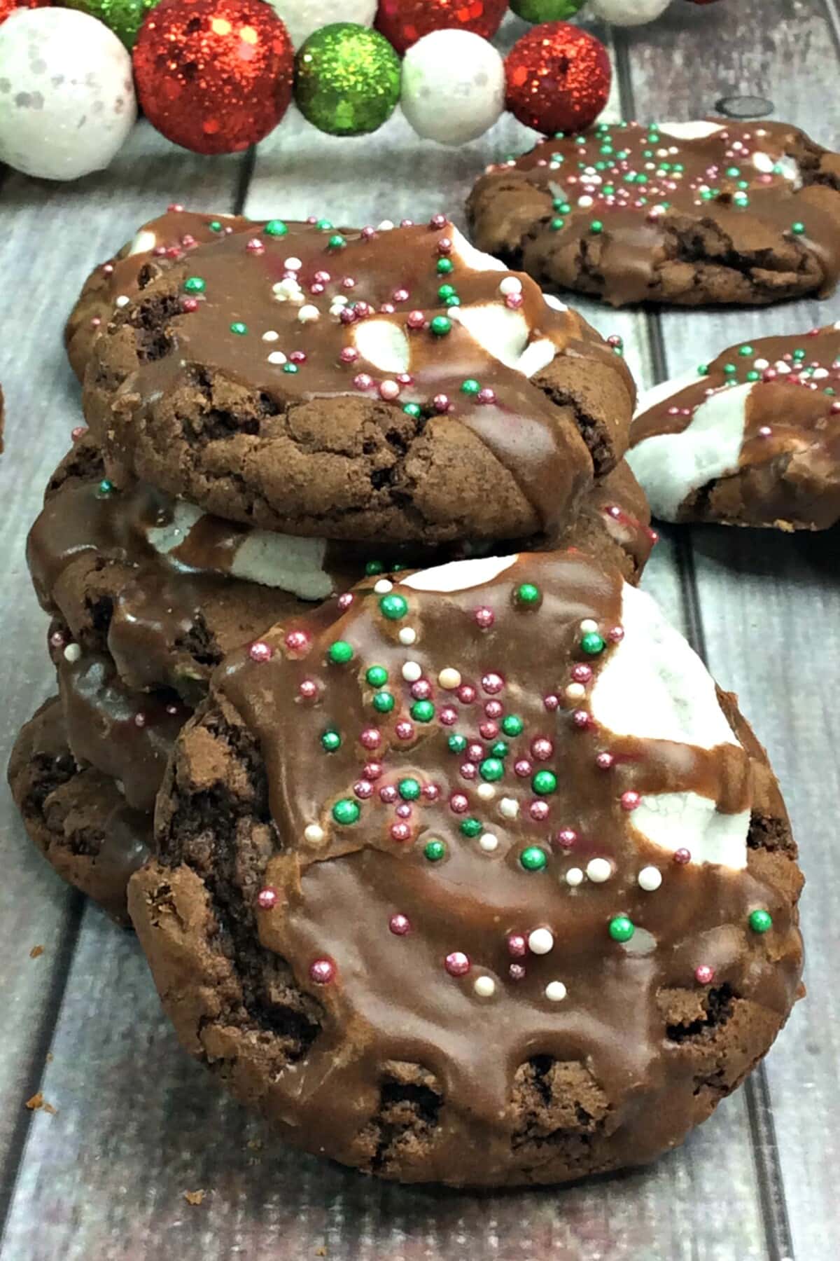 hot cocoa cookies on a board in a pile