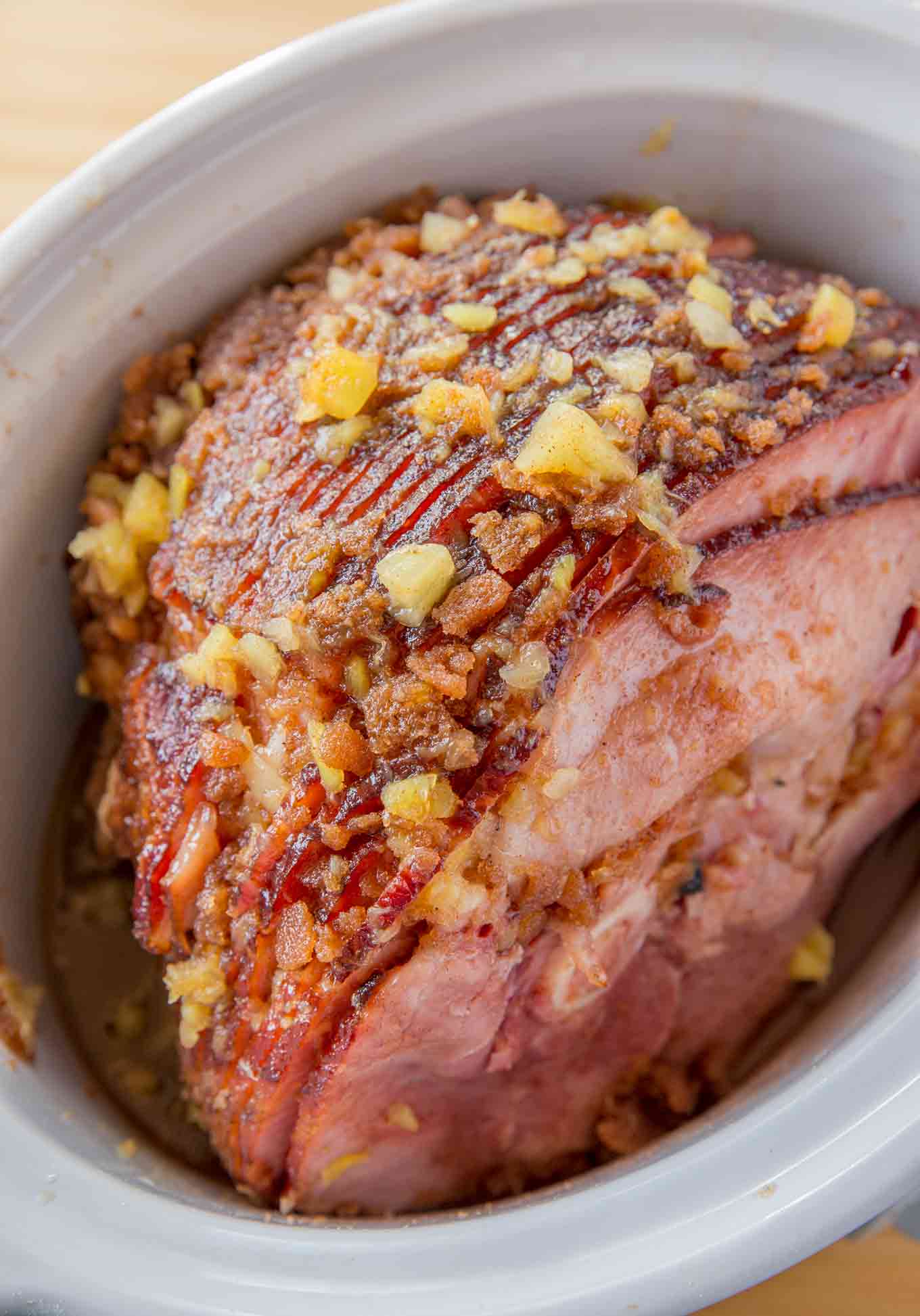 Overhead view of slow cooker ham with pineapple glaze