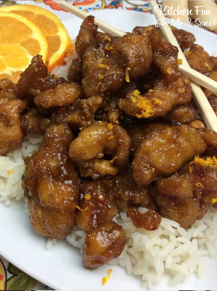 Copycat Orange Chicken on a plate with rice
