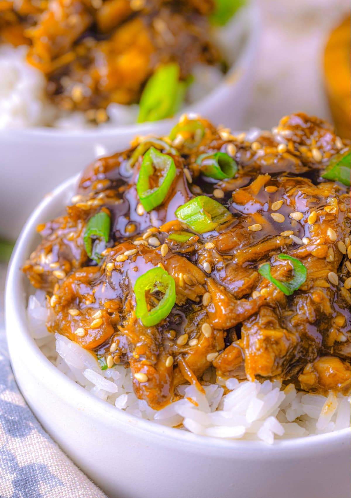 Slow Cooker Teriyaki Chicken in a bowl with rice