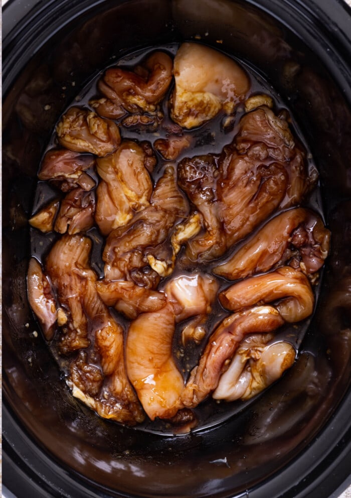 chicken in sauce in a crock pot