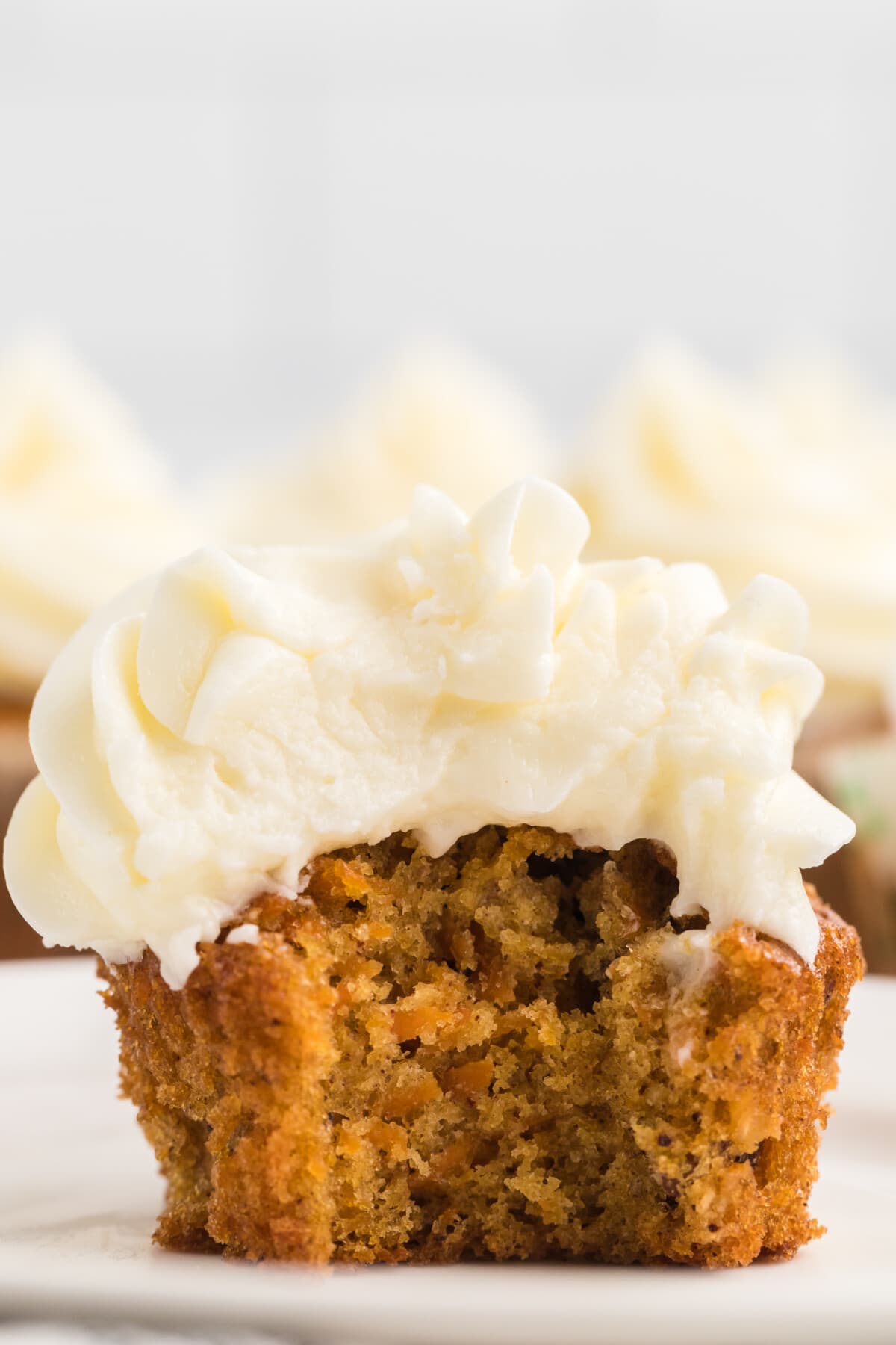 Carrot Cake Cupcakes with a bite taken out