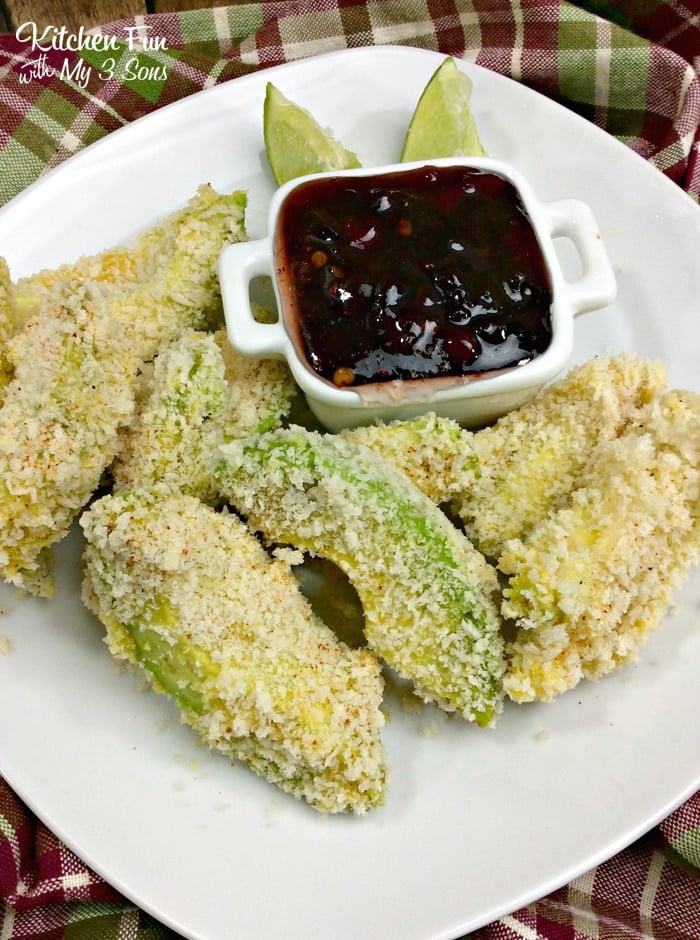 Airfryer Avocado Fries on a white plate with dipping sauce