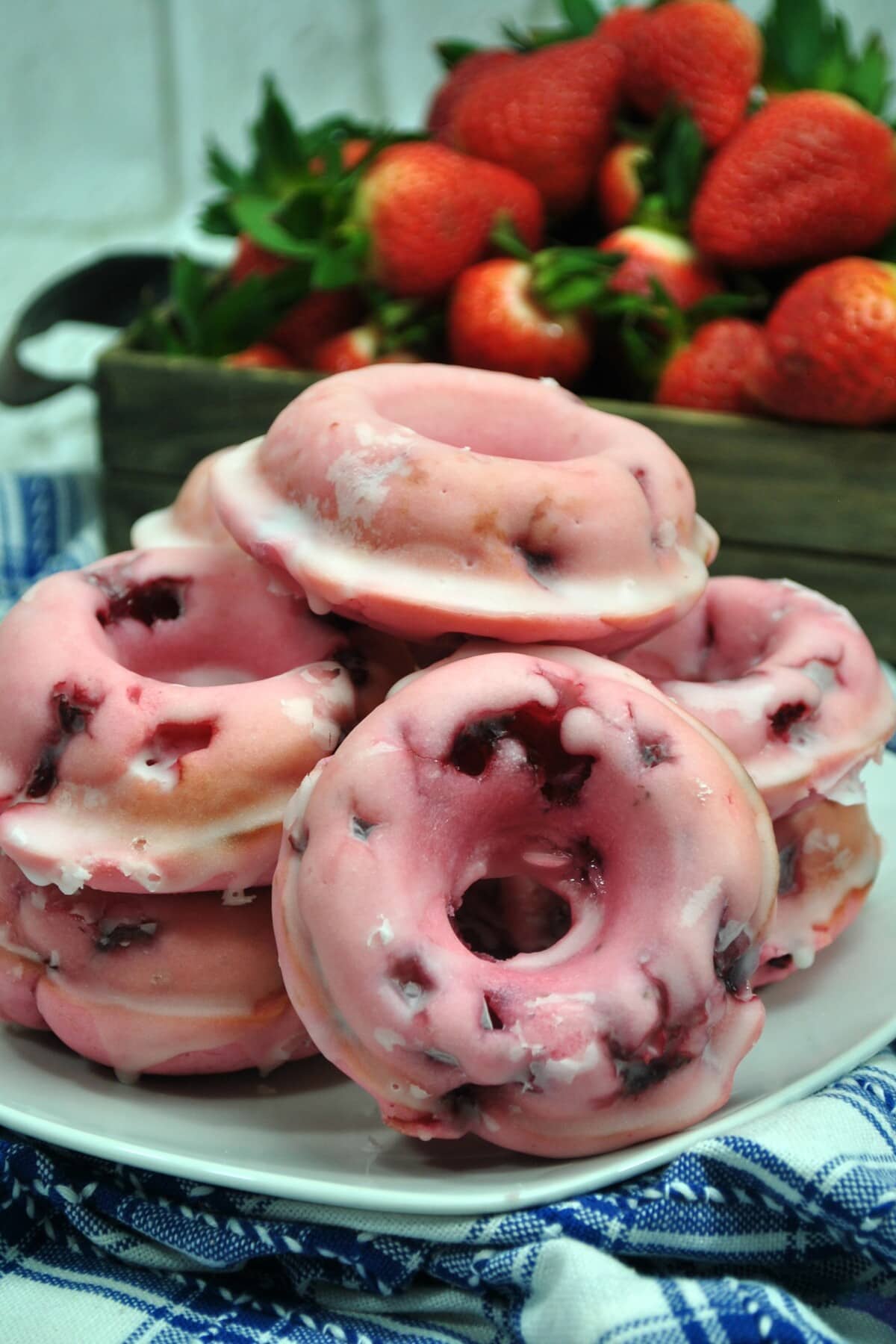Strawberry Donuts stacked on a plate