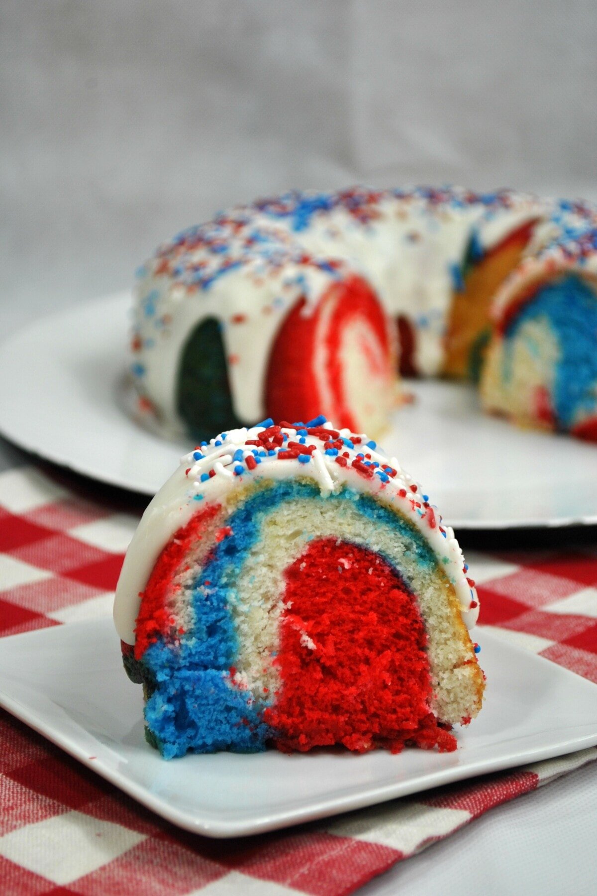red white and blue cake on a white palte