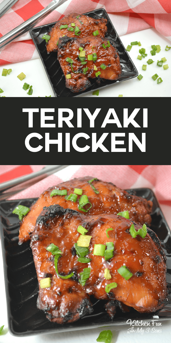 Two teriyaki chicken thighs on a black plate