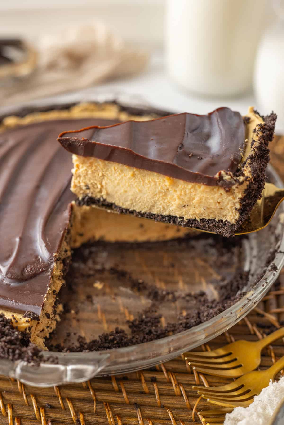 Serving a slice of chocolate peanut butter pie