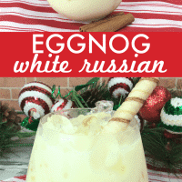 White Russian eggnog in a glass with ice cubes.