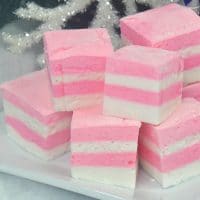 Sugar plum marshmallows with pink and white stripes.