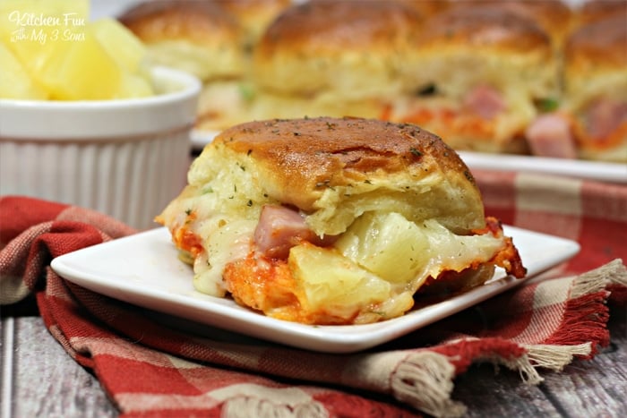 This Hawaiian pizza sliders recipe is one of my favorite easy dinners with chunks of ham and pineapple on sweet rolls.