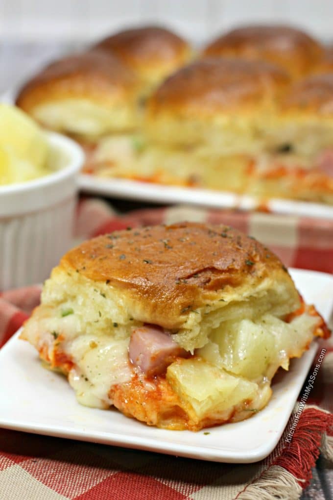 This Hawaiian pizza sliders recipe is one of my favorite easy dinners with chunks of ham and pineapple on sweet rolls.