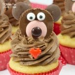 These Valentine Bear Cupcakes are so adorable! The cute little bear on top of these yummy french vanilla cupcakes are made from everyone's favorite sweet treat: Reese's cups!