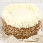 This Carrot Cake Cheesecake Cake recipe is layered with moist cake, cream cheese frosting and cheesecake. This is the best way to make a carrot cake!