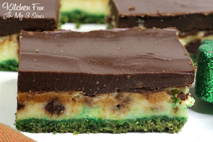 These Bailey's Cheesecake Bars are a yummy combination of cheesecake and chocolate ganache on a graham cracker crust. Perfect St. Patty's Day dessert!