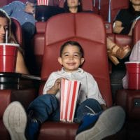Kids Can Get A Movie Ticket, Popcorn, Drink And Snack For $4 At AMC Theatres This Summer