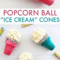 Popcorn balls on top of pink and blue ice cream cones.