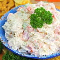 This Crab Dip recipe has a kick of spicy jalapenos, bell peppers and siracha. This is a great recipe to take to your next pot-luck!