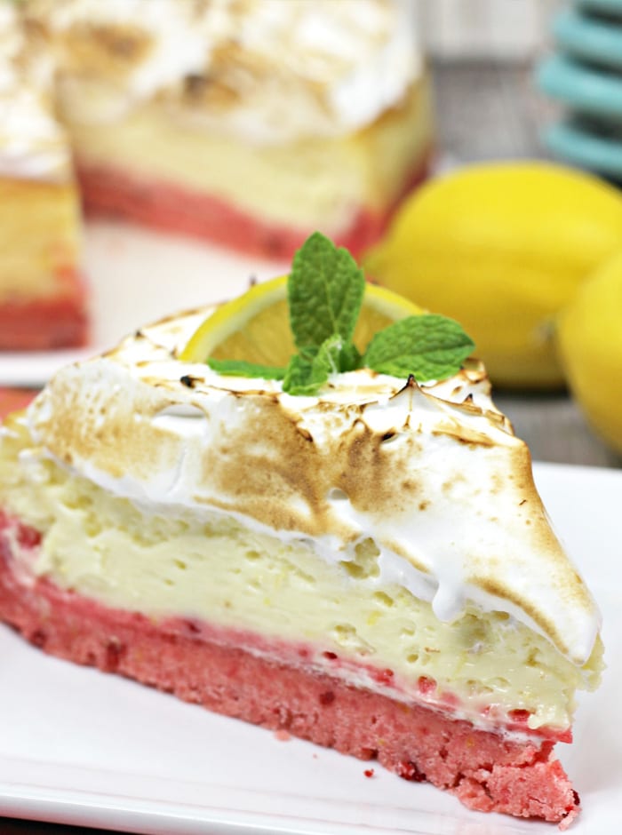 Strawberry Lemon Cheesecake is a delicious combination of strawberry crust, lemon cheesecake and meringue on top.