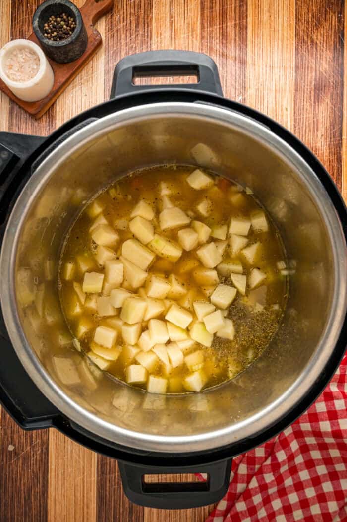 With a creamy base and tender chunks of potato in every bite, this Instant Pot Potato Soup comes together in just 45 minutes. Diced potatoes and broth in an instant pot