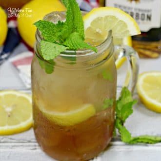 Grab a mason jar and invite friends over to enjoy the Bourbon Mint Tea that promises to put a little kick in summer's favorite drink - iced tea.