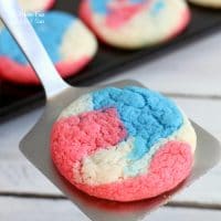 Patriotic Cake Mix Cookies are a swirl of red, white and blue that's perfect for the 4th of July. They're an easy cookie recipe that always taste yummy.